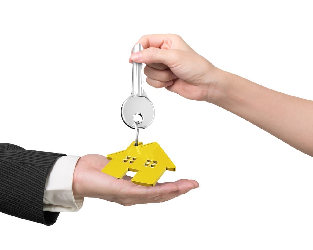 silver key with gold house shape keyring